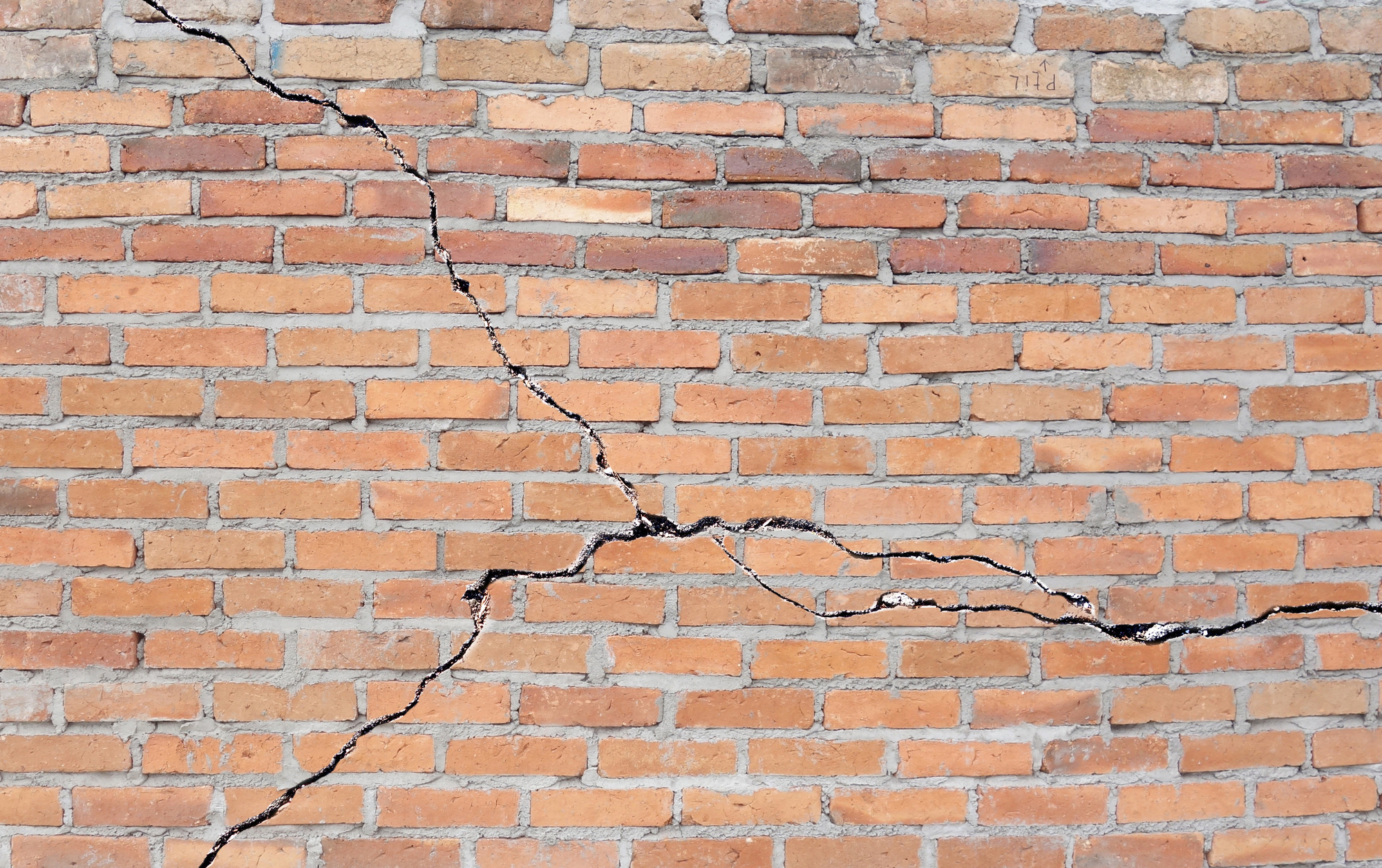 Cracked brick foundation